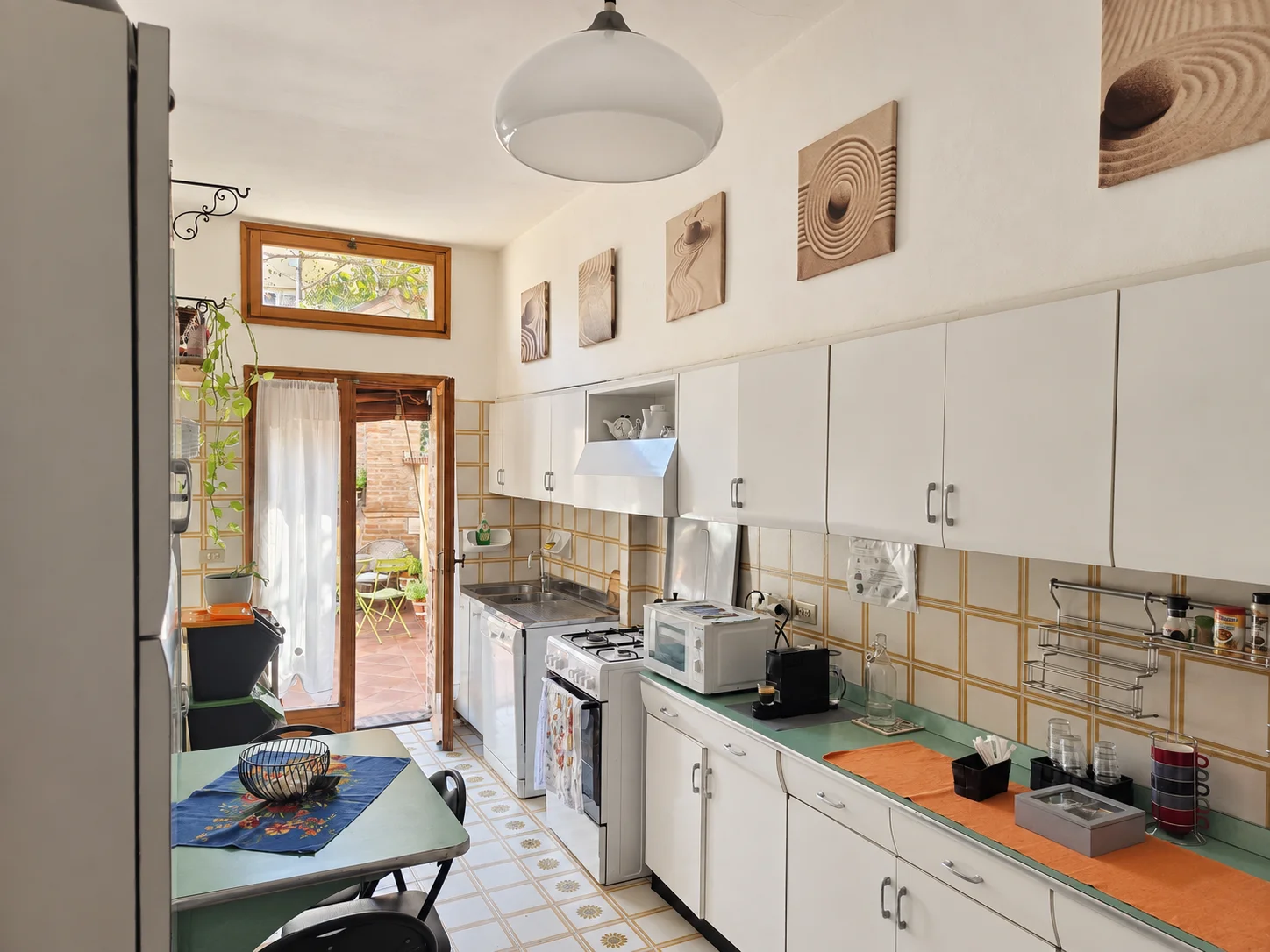 Cucina comune attrezzata a disposizione degli ospiti